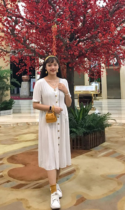 A picture containing tree, ground, outdoor, clothingDescription automatically generated