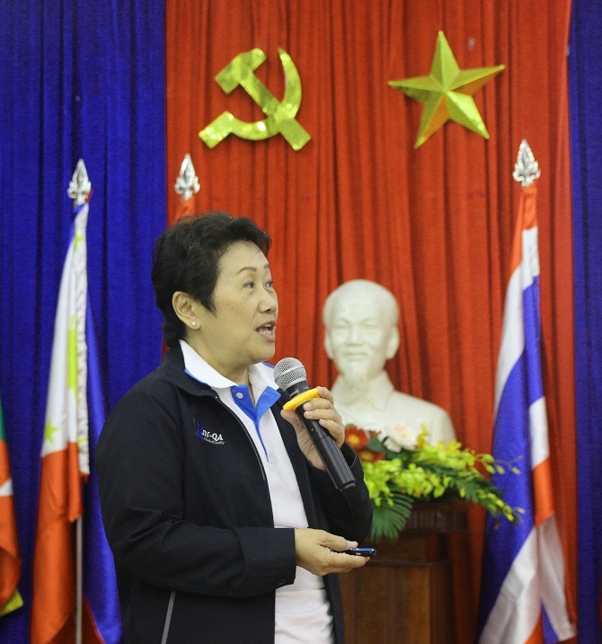 A person in a suit and tieDescription automatically generated