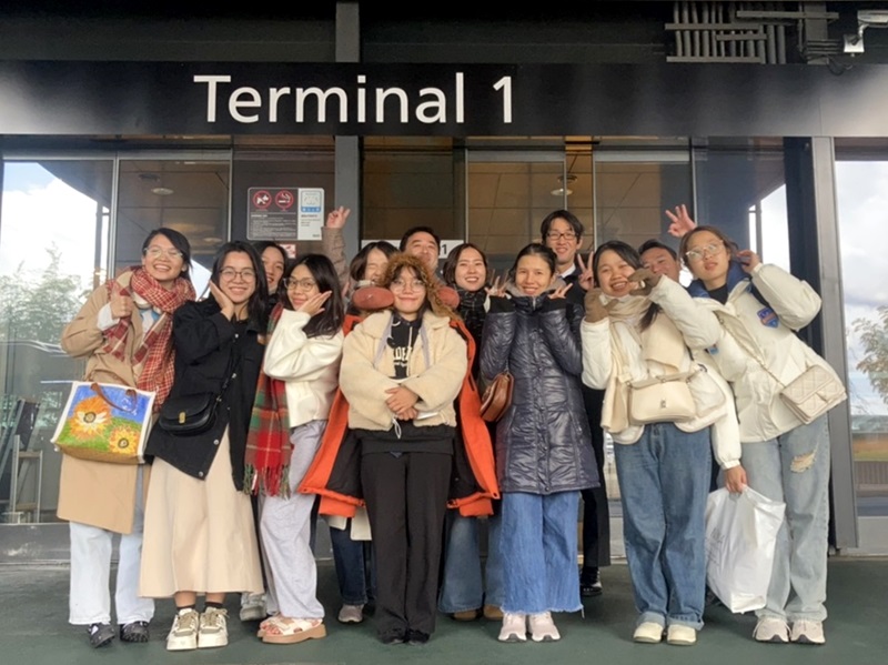 A group of people posing for a photoDescription automatically generated