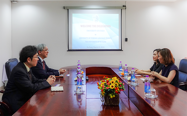 A group of people sitting at a tableDescription automatically generated