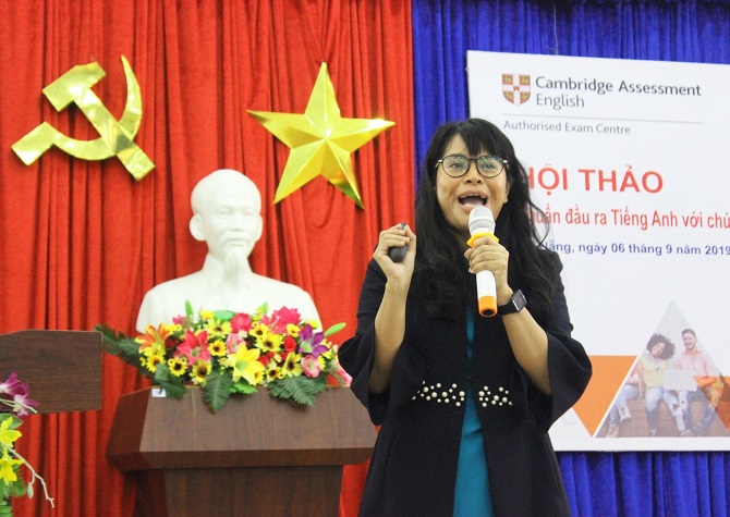 A picture containing woman, building, person, girlDescription automatically generated