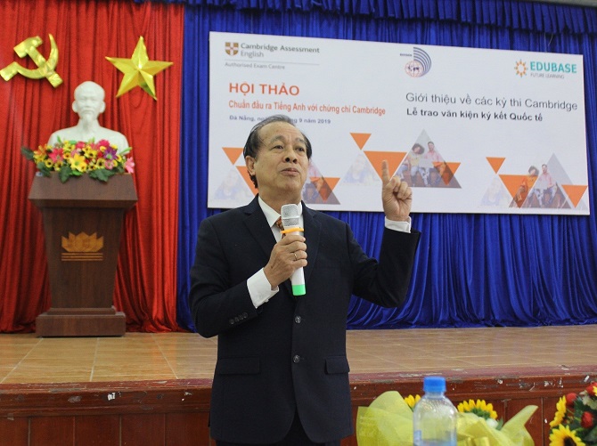 A person in a suit and tieDescription automatically generated