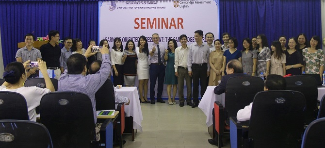 A crowd of people in a roomDescription automatically generated