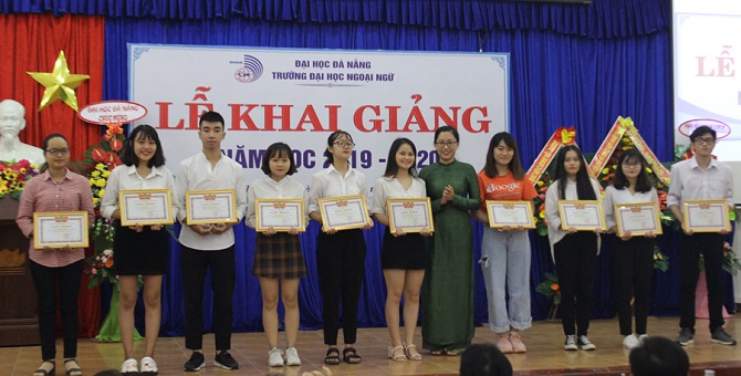 A group of people posing for a photoDescription automatically generated