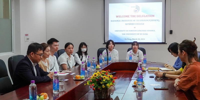 A group of people sitting at a tableDescription automatically generated