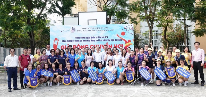 A group of people posing for a photoDescription automatically generated