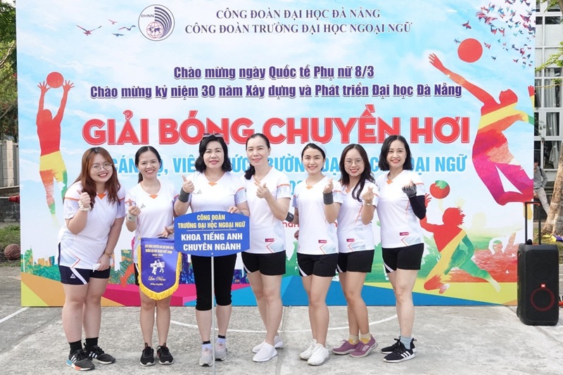 A group of women posing for a photoDescription automatically generated